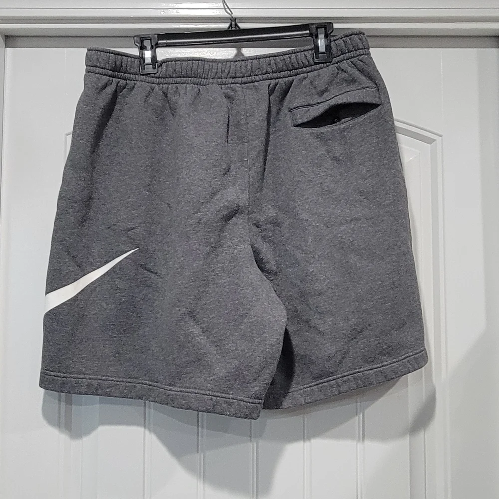 Nike Men's Sportswear Club Fleece Graphic Shorts in gray with a white Swoosh log - Picture 2 of 5